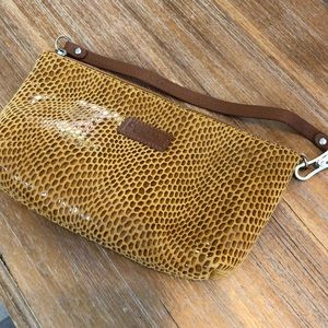 Sorial leather wristlet